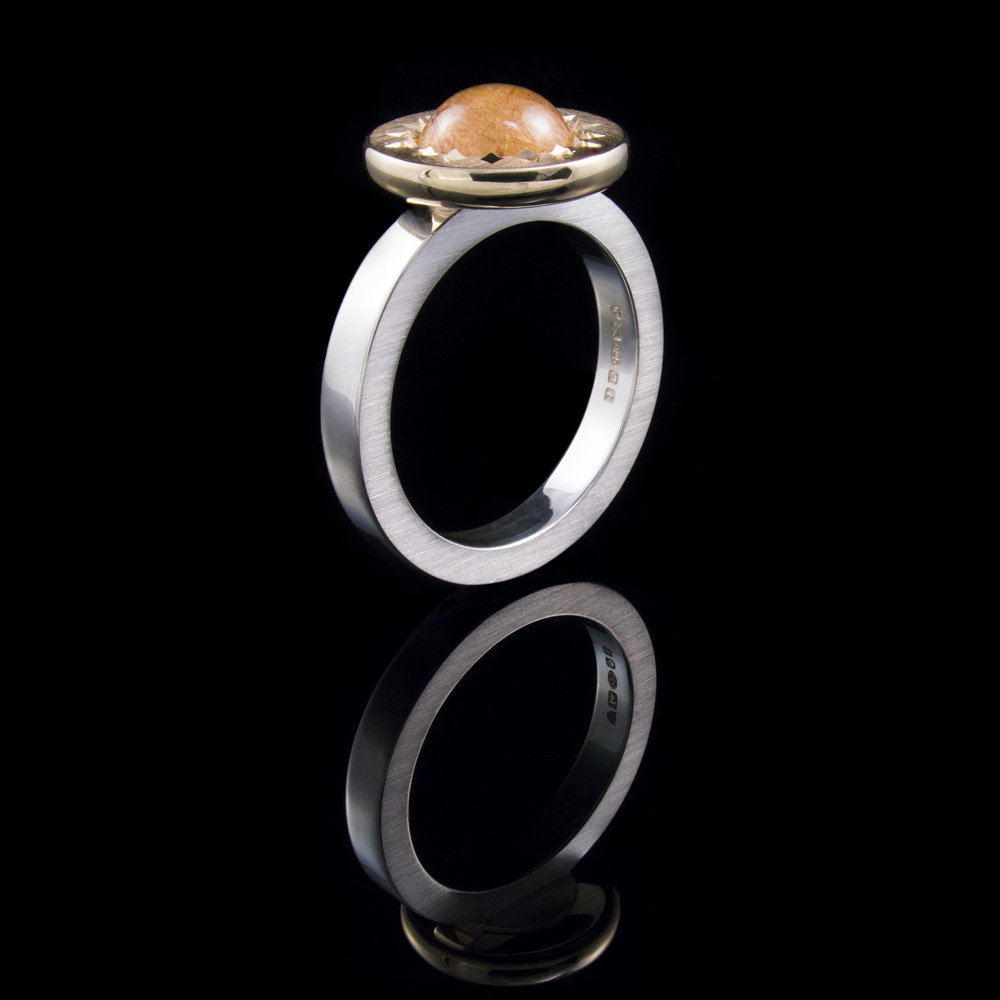 starburst-ring-rutilated-quartz-standing-1000x1000