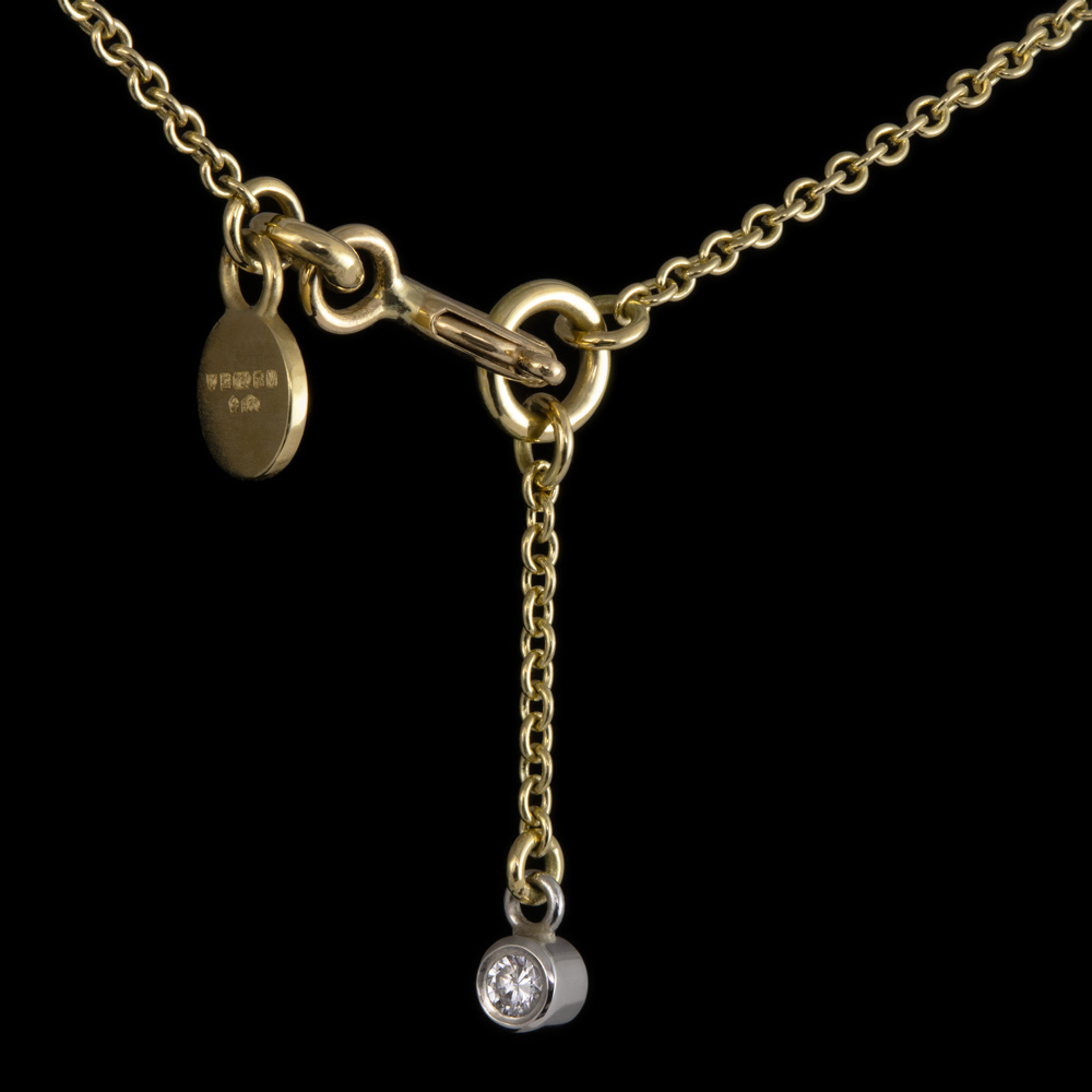 diamond sapphire bespoke pendant gold platinum